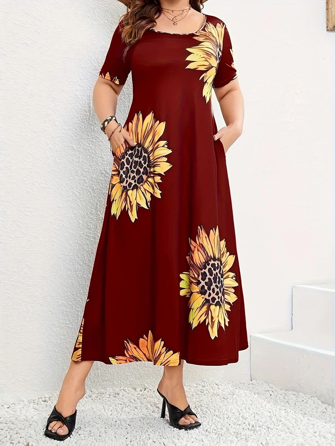 Summer maxi dress for women with sunflower floral pattern and practical pockets Lune London