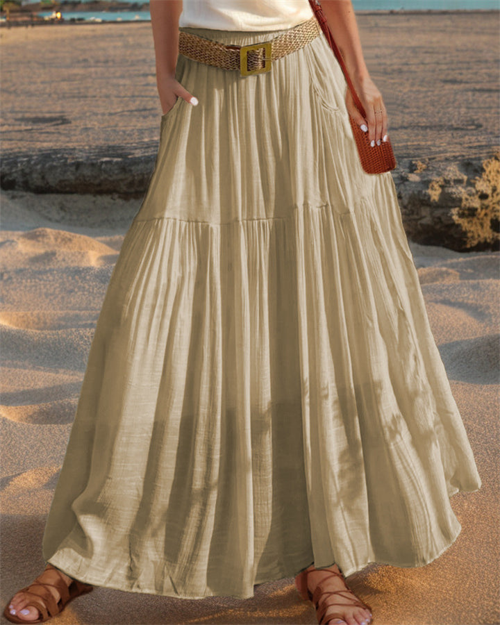 Maxi flared skirt for women with elegant pleated draping and practical pockets Lune London