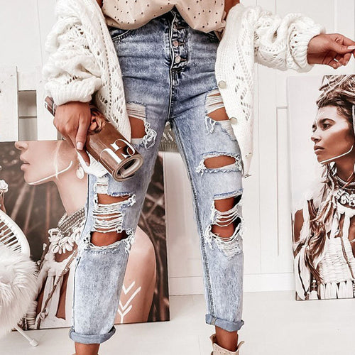 Women's destroyed jeans in casual boyfriend cut with high waist and details Lune London