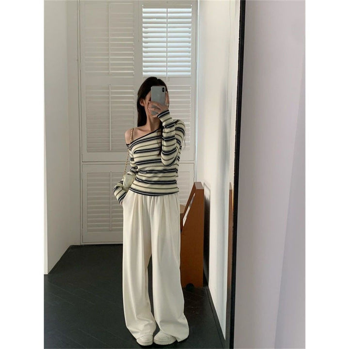 Ladies trendy long sleeve shirt with off-shoulder design and maritime stripe pattern Chic & Stil