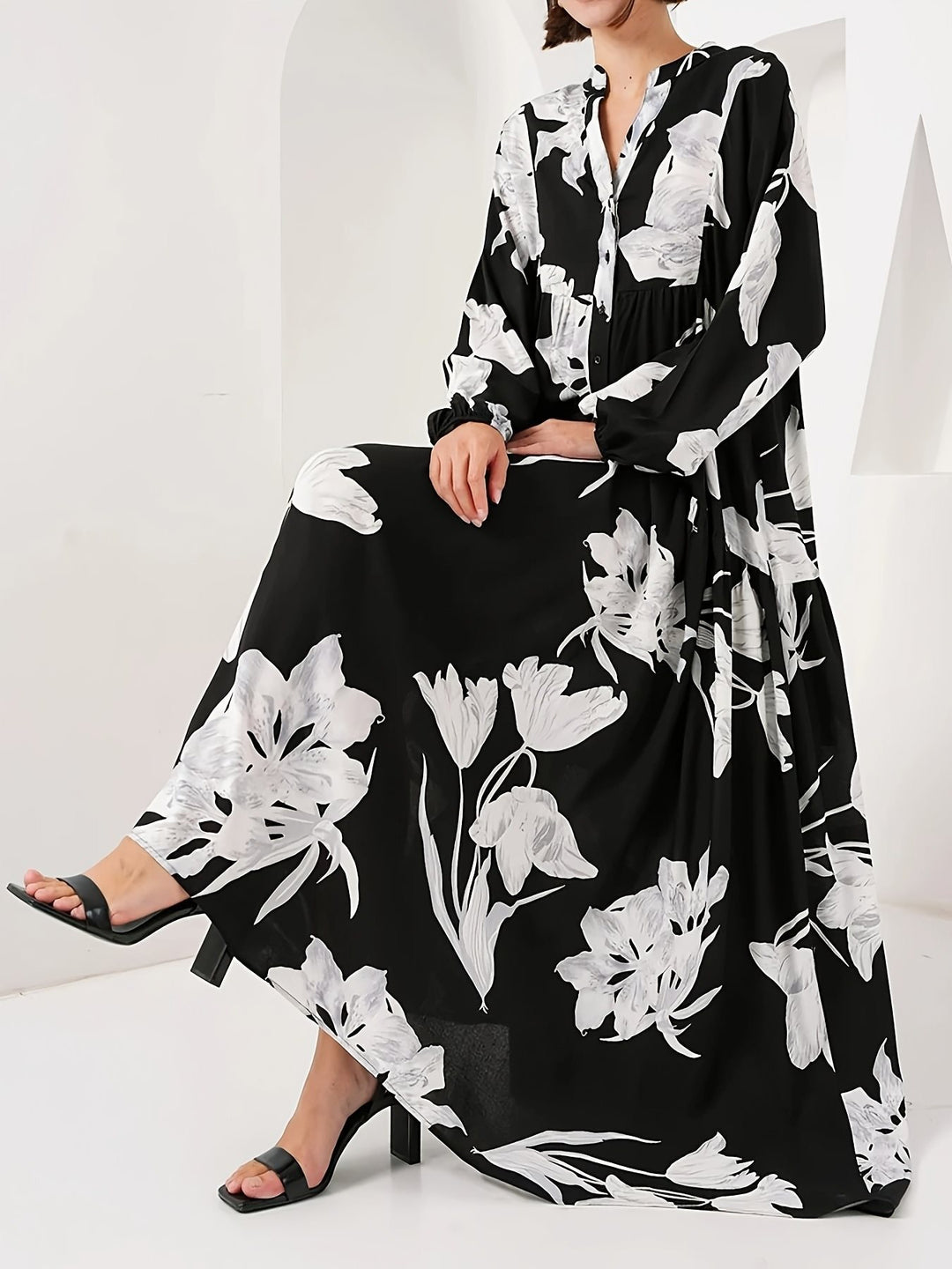 Women’s maxi dress with floral print and elegant button design Lune London