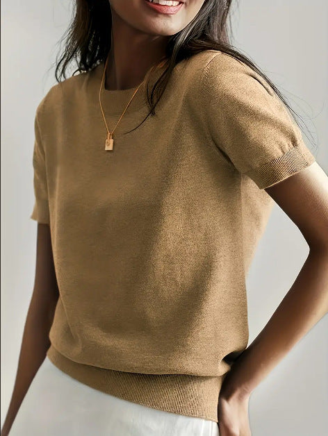 Fine knit sweater for women with a short sleeve silhouette and a soft fluid material Elegance and style