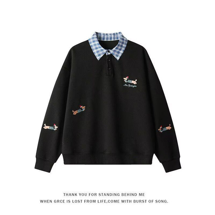 Women's sweater with an elegant checkered pattern and a chic animal print.