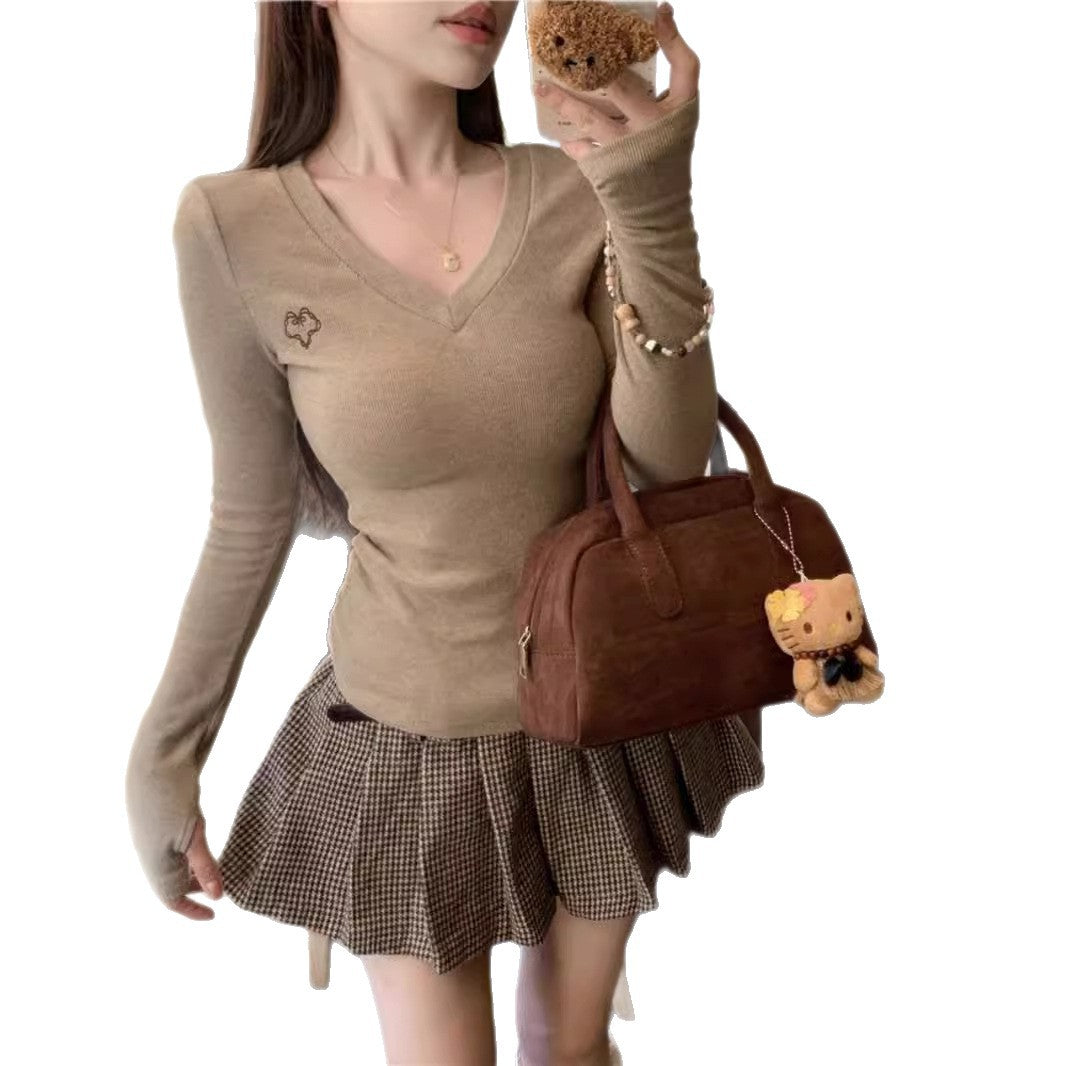 Women's long-sleeve shirt with V-neck and elegant rib structures Chic & Stil