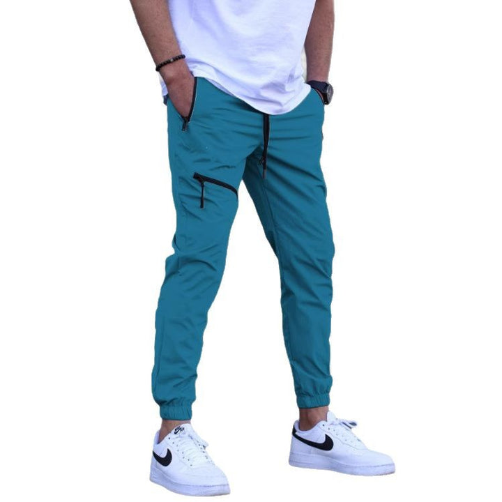 Sport suit trousers for men with elastic waistband and zip pockets on the sides Lune London