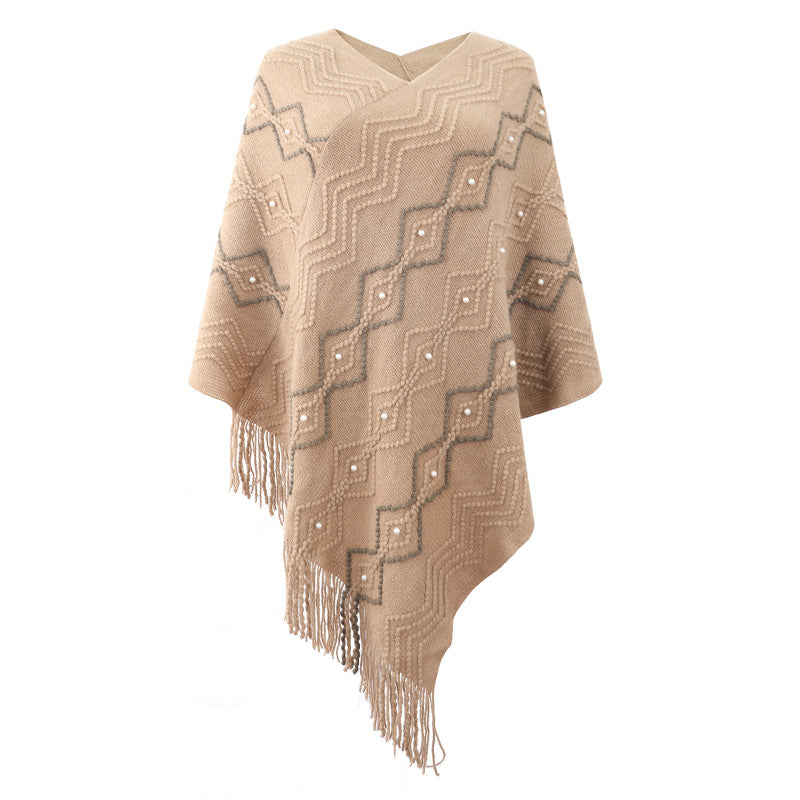 Lune London Elegant poncho for women with a striking textured pattern and decorative fringes