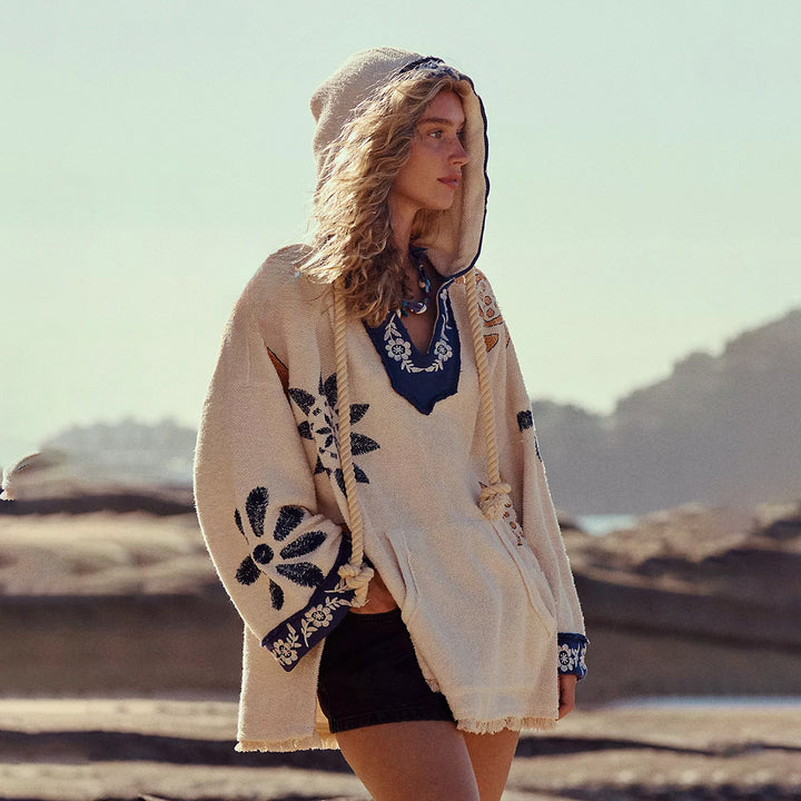 Hooded poncho for women with colorful embroidery and fringed edges Lune London