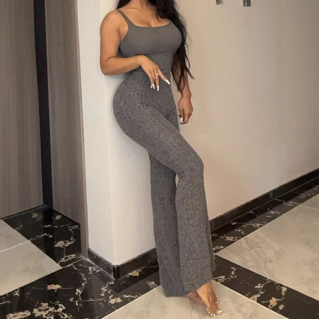 Women's outfit with fitted top and flared wide-leg pants Lune London