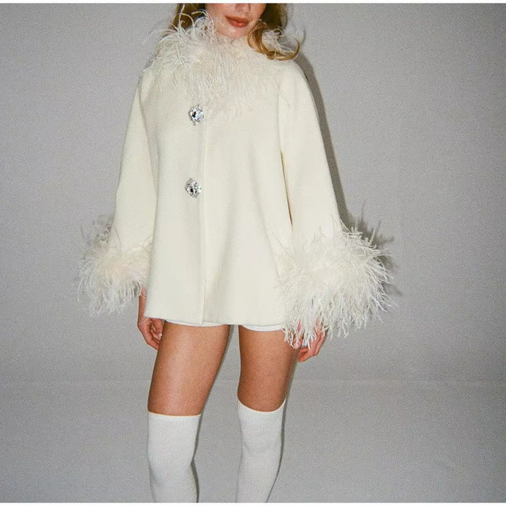 Manteau élégant féminin avec plumes Chic & Stil