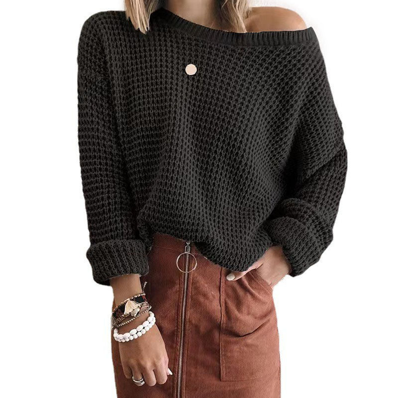 Oversized casual style knitted sweater for women with an off-shoulder design.
