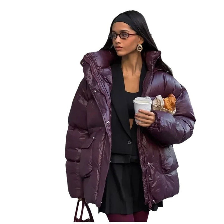 Oversized fashionable down jacket for women with a belted waist and side pockets Lune London