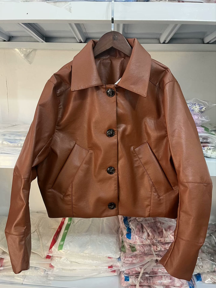 Women's faux leather jacket with modern button details Lune London