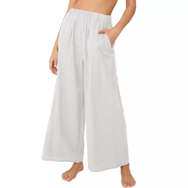 Summer pants for women, loose-fitting, with elastic waist and practical side pockets Chic and Style