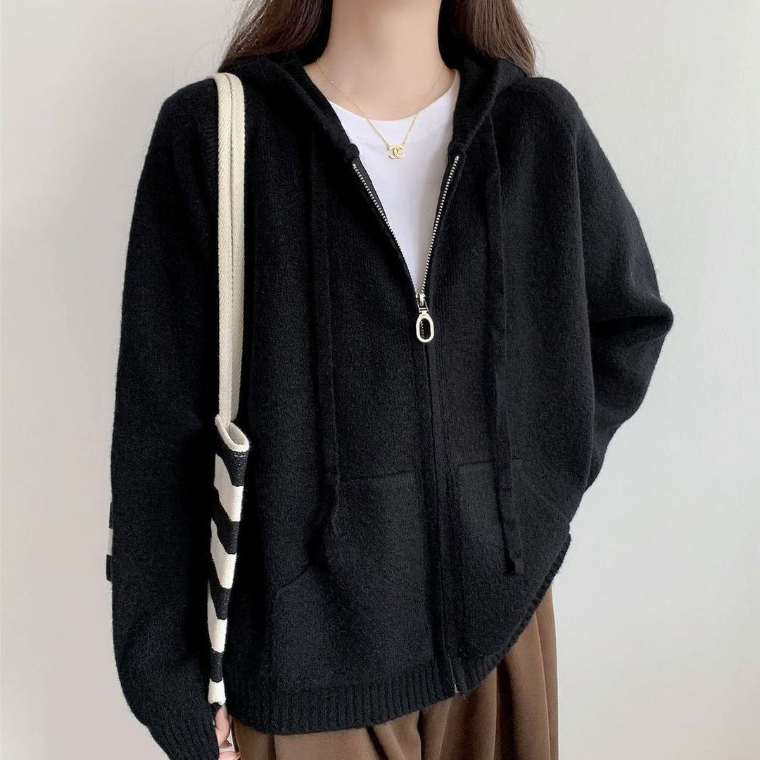 Veste à capuche pour femmes surdimensionnée avec une coupe courte et des poches pratiques Chic & Stil