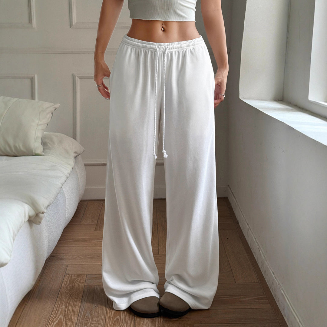 Loose and comfortable summer pants for women with elastic waistband and drawstring Lune London