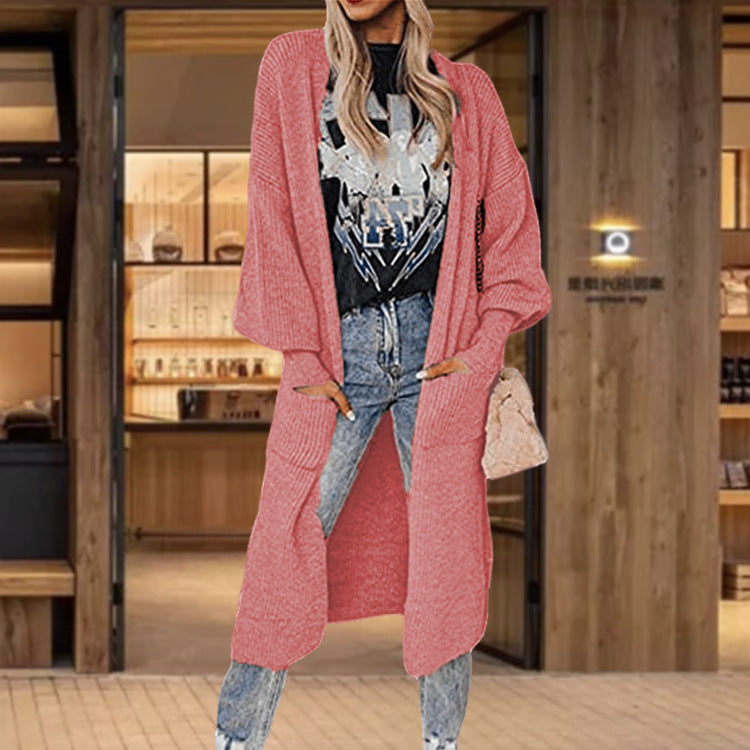 Knitted cardigan for women with wide sleeves and practical inset pockets Lune London