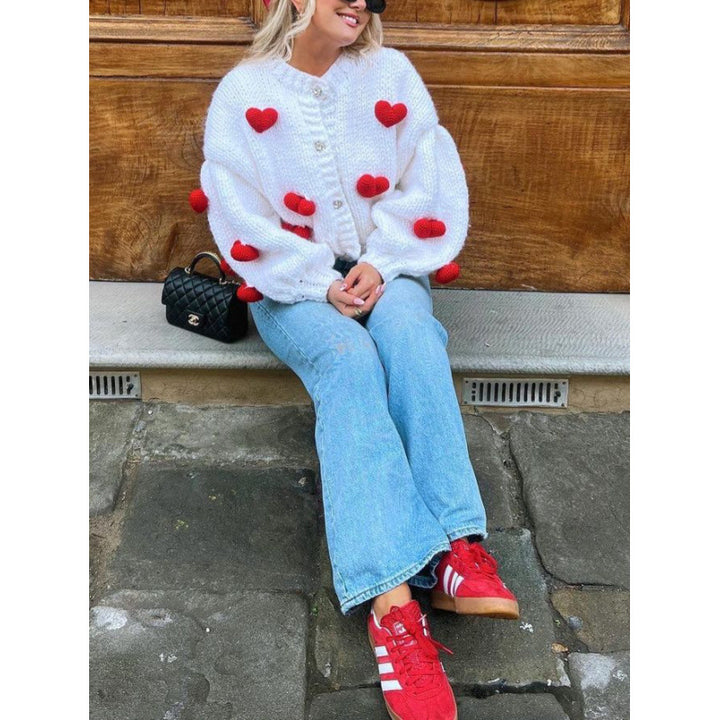 Ladies playful knitted cardigan with heart-shaped appliqués Lune London
