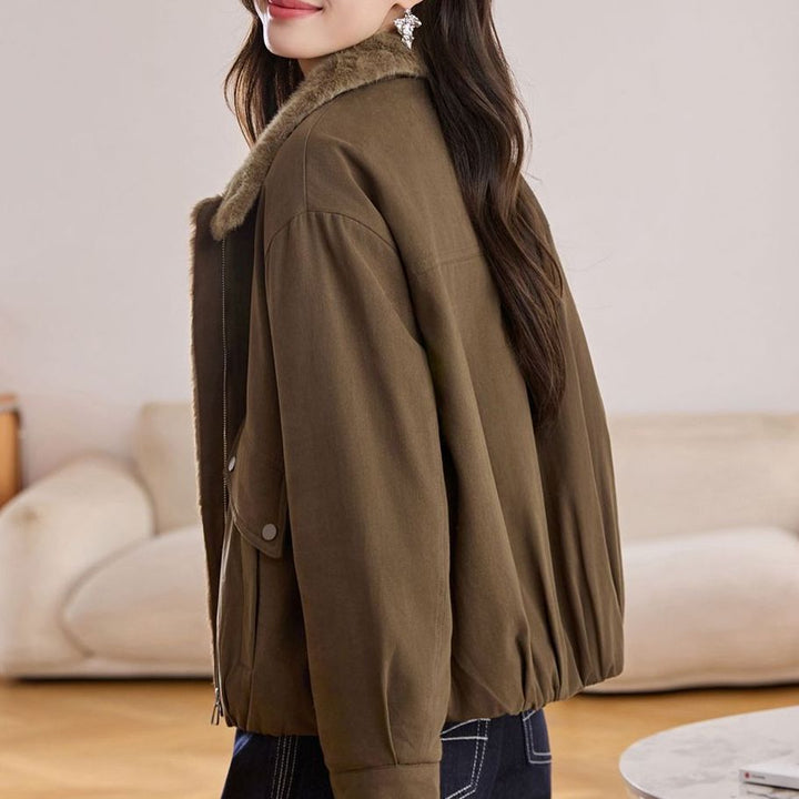 Veste matelassée chaude pour femmes avec col duveteux et poches pratiques Chic & Stil