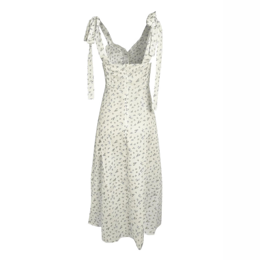 Ladies Elegant Summer Dress with a delicate floral pattern and refined straps Lune London