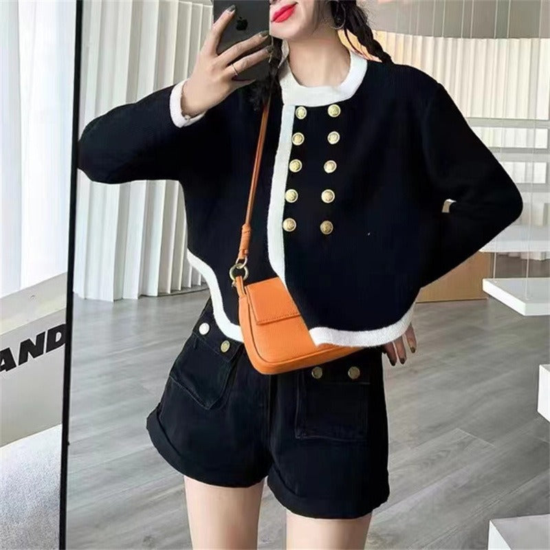 Elegant ladies cardigan with gold button details and contrasting finishes Lune London