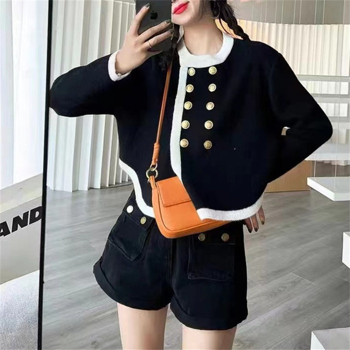 Elegant ladies cardigan with gold button details and contrasting finishes Lune London