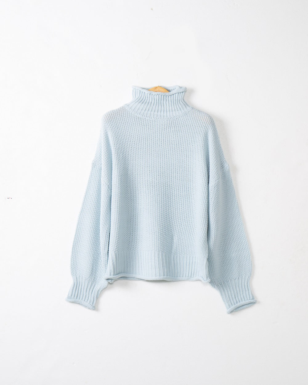 Chunky knit sweater for women with high collar and dropped shoulders Lune London