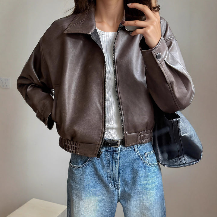 Oversized synthetic leather jacket for women with a modern look featuring a convenient zipper and elastic waist Lune London