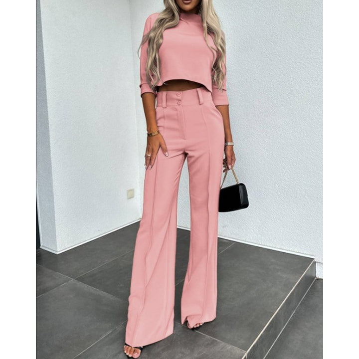 Woman trendy cropped top with elegant palazzo pants Lune London
