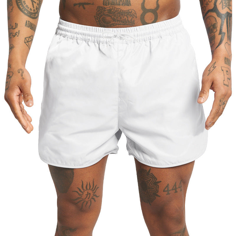 Shorts de bain pour hommes avec taille élastique et poches latérales pratiques Lune London