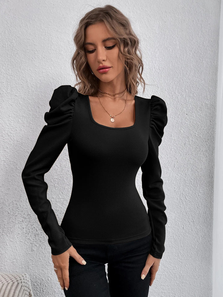 Haut à manches longues pour femmes avec détails de manches bouffantes Chic & Stil
