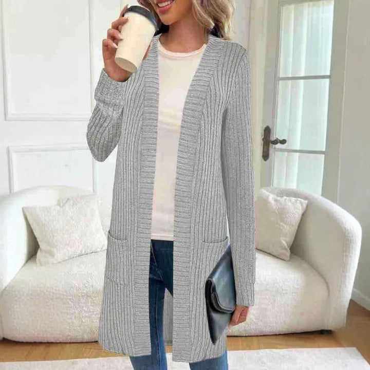 Knitted women's jacket with asymmetrical hem and practical pockets Lune London