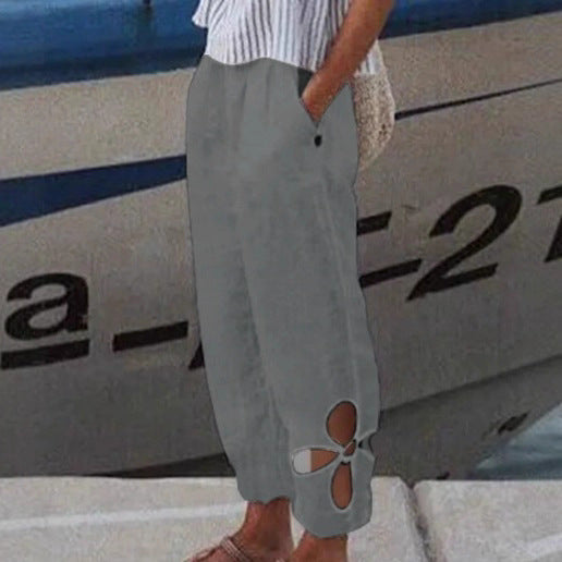 Pantalons Palazzo pour femmes avec découpes florales et poches latérales pratiques Chic & Stil