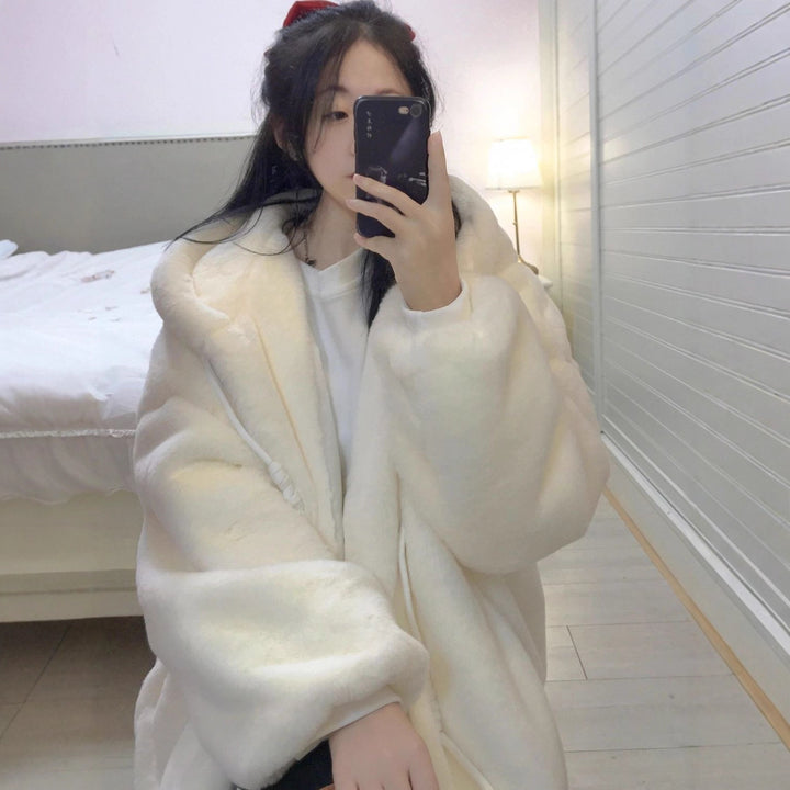 Manteau en peluche pour femmes avec coupe généreuse et col montant Chic & Stil