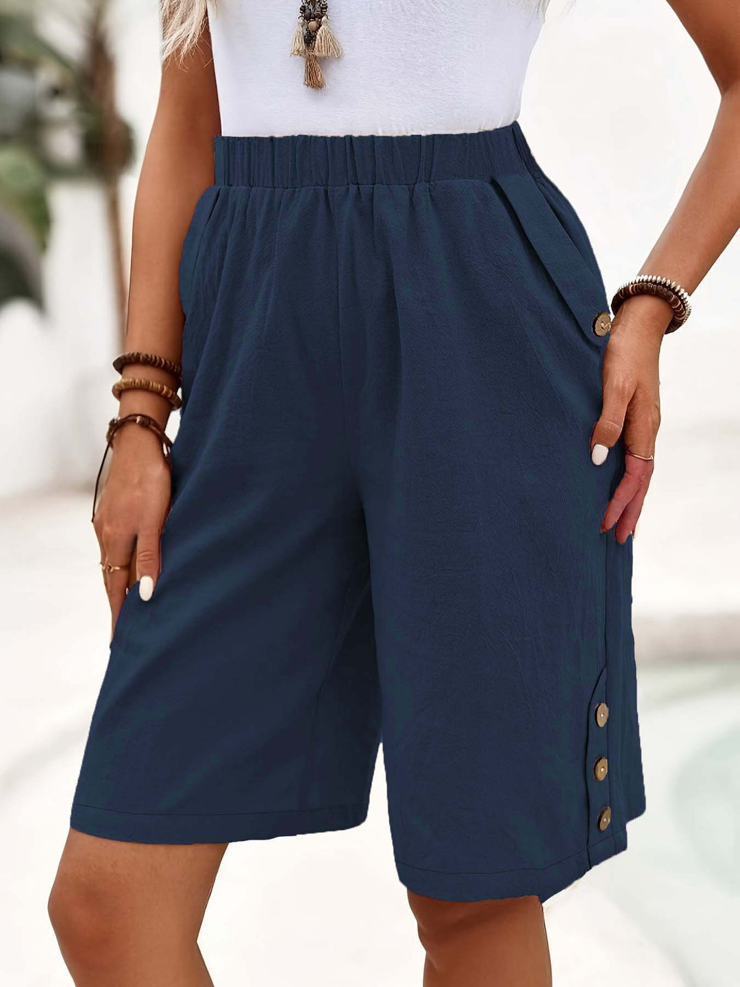 Lightweight women's shorts with practical button details Lune London