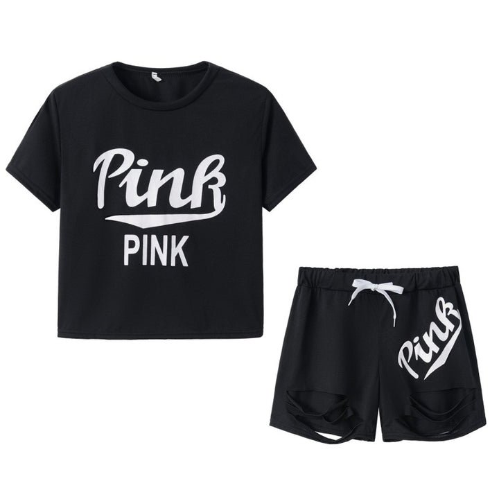 Ensemble t-shirt et short pour femmes sportif avec coupe décontractée et imprimés contrastés Chic & Stil