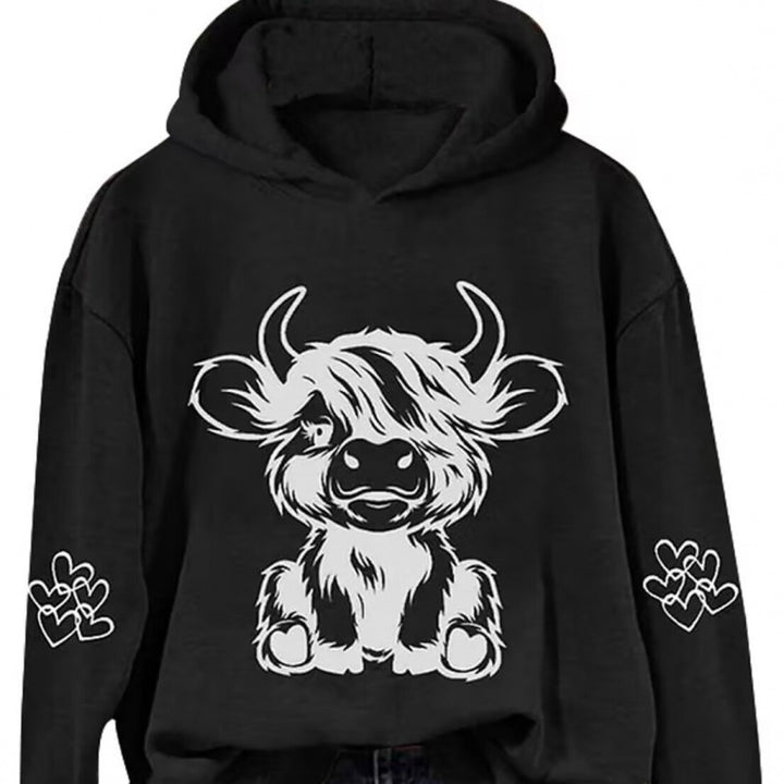 Women's hooded sweatshirt with charming cow motif and practical kangaroo pockets Lune London