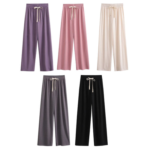 Wide palazzo pants for ladies with elastic waistband and decorative cord Lune London