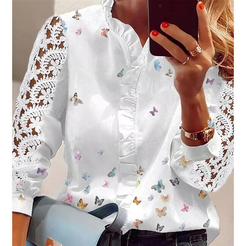 Women's blouse with floral appliqués, ruffle details, and lace sleeves Lune London