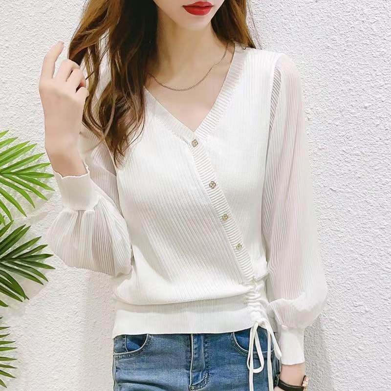 Elegant knitted sweater for women with button details and transparent sleeves Lune London
