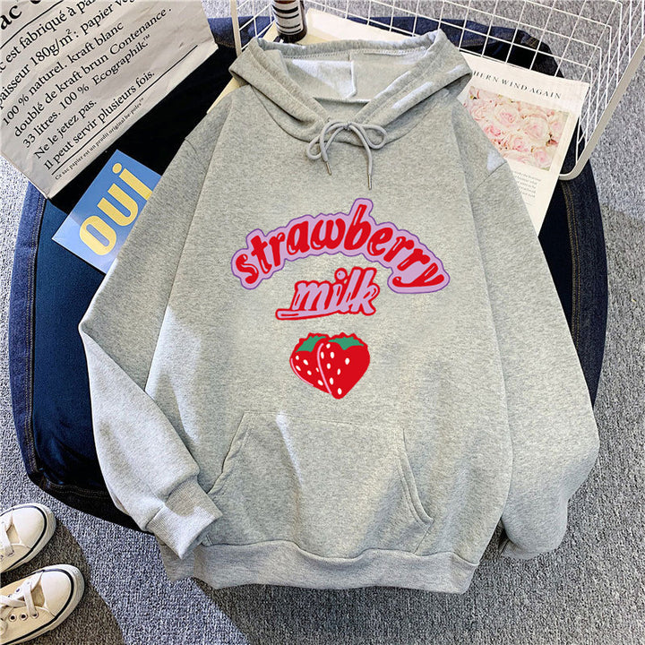Ladies hooded sweatshirt with cheerful strawberry milk design Chic & Stil