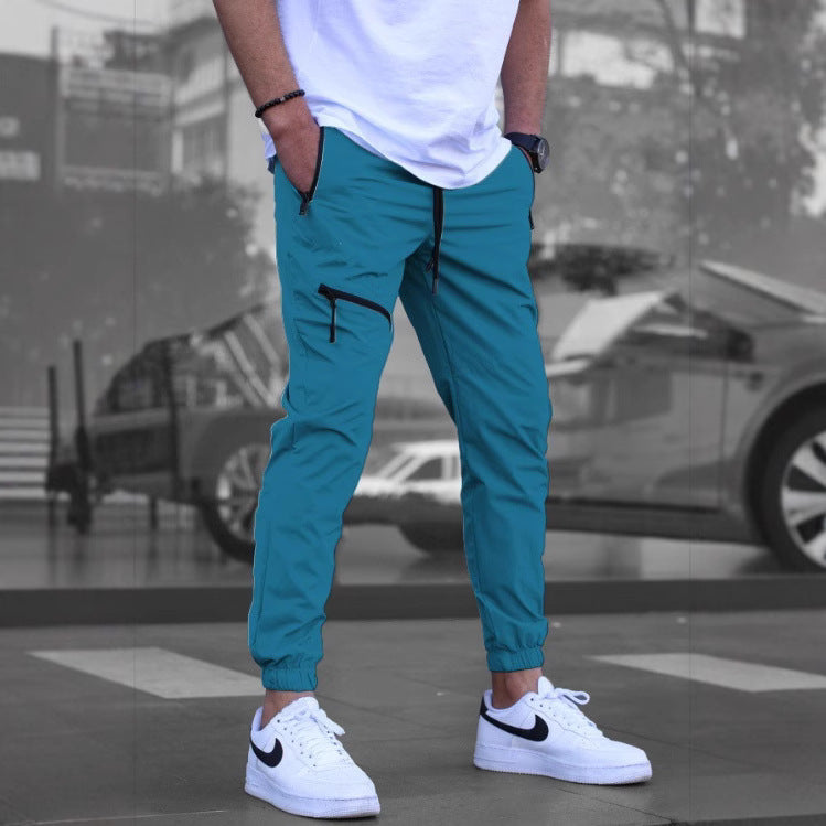 Men's sporty leisure pants with elastic waistband and practical zip pockets Lune London
