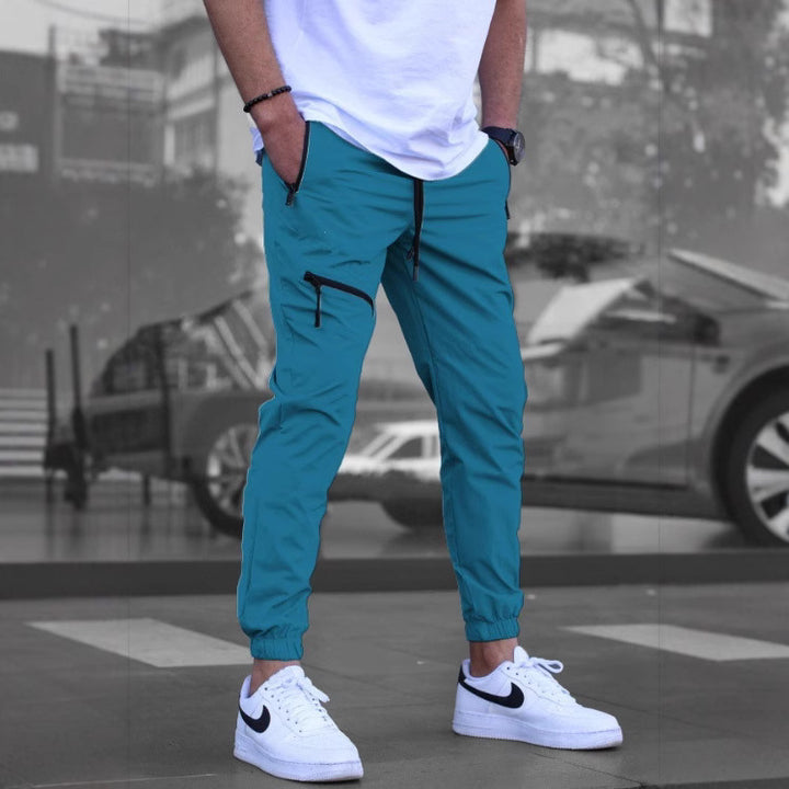 Men's sporty leisure pants with elastic waistband and practical zip pockets Lune London
