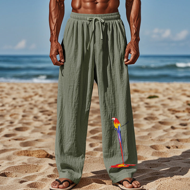 Casual beach pants for men with elastic waistband and colorful bird pattern Lune London