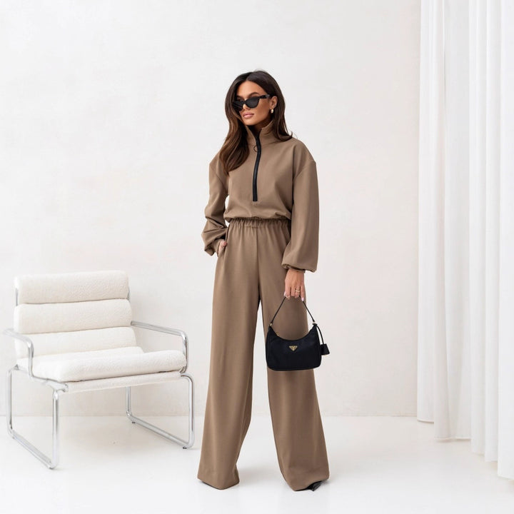 Women elegant jumpsuit with high collar and zipper Chic & Stil