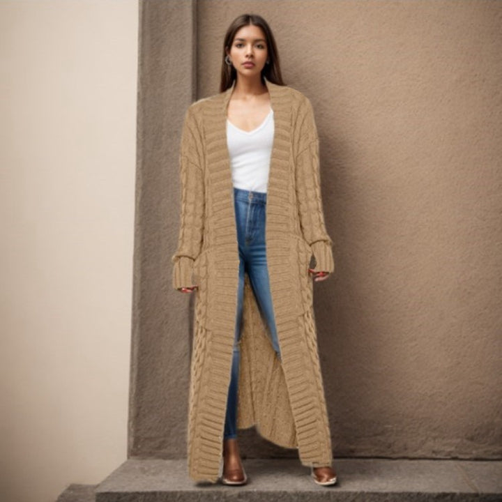 Women Thick knitted cardigan with a refined cable design and practical pockets Lune London