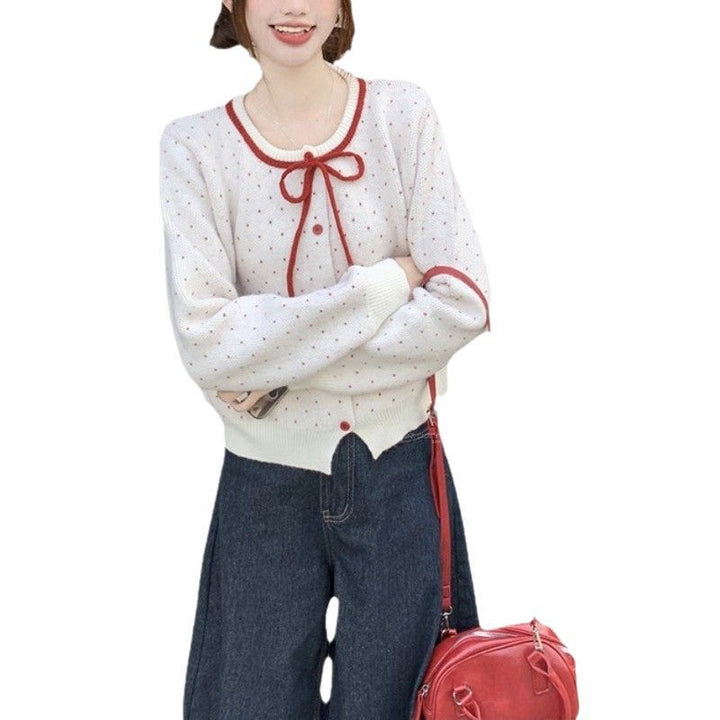 Cardigan féminin avec des pois et un nœud Chic & Stil