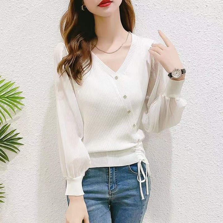 Elegant knitted sweater for women with button details and transparent sleeves Lune London