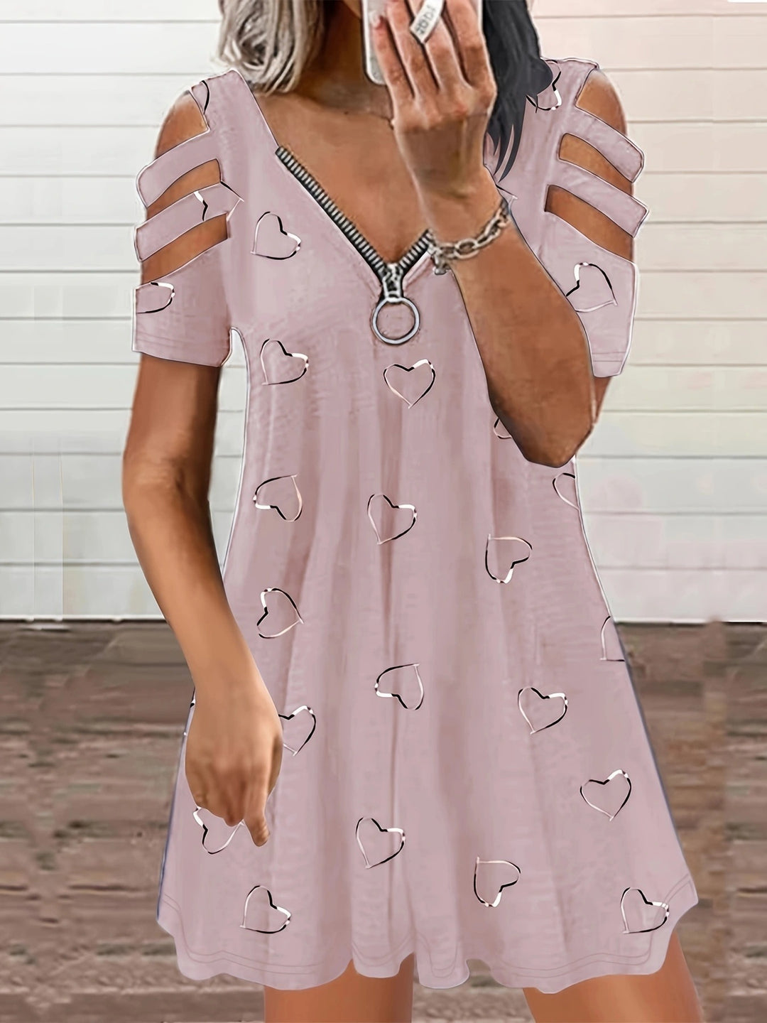 Casual dress for women with cut-out sleeves and heart pattern Lune London