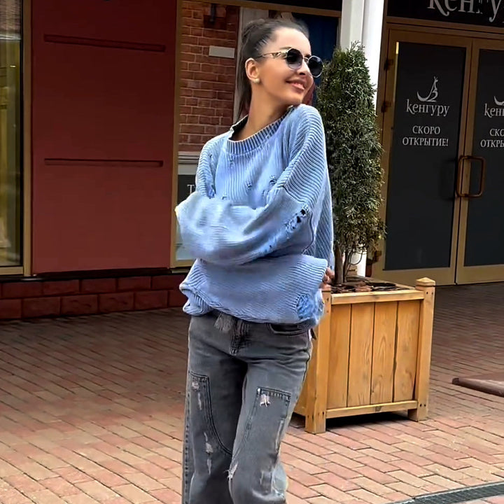 Casual women's sweater with a trendy ripped design and voluminous sleeves Lune London