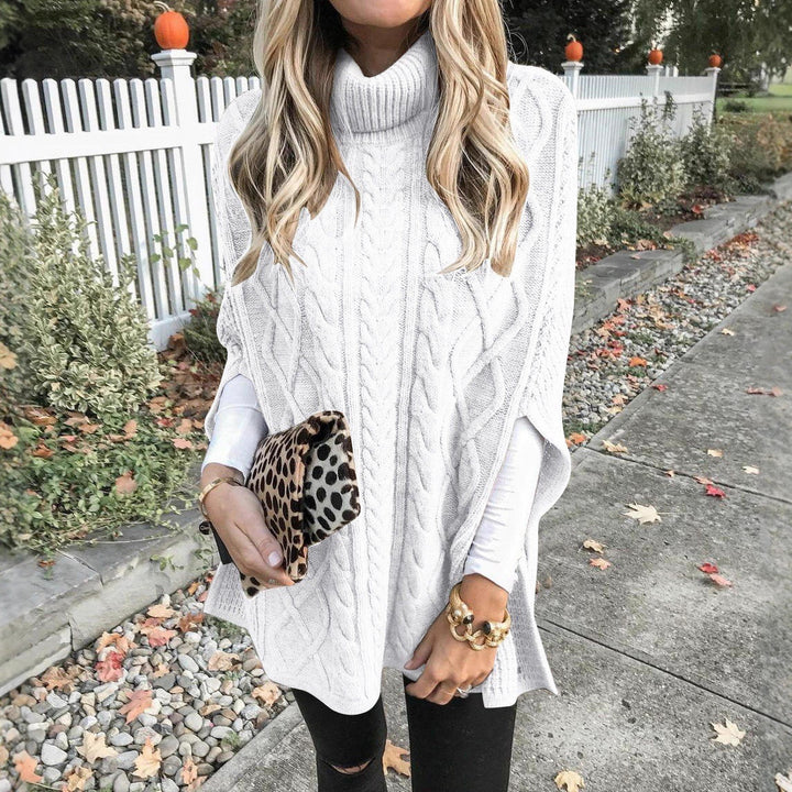 Knit poncho for women with high collar and decorative cable knit pattern Lune London